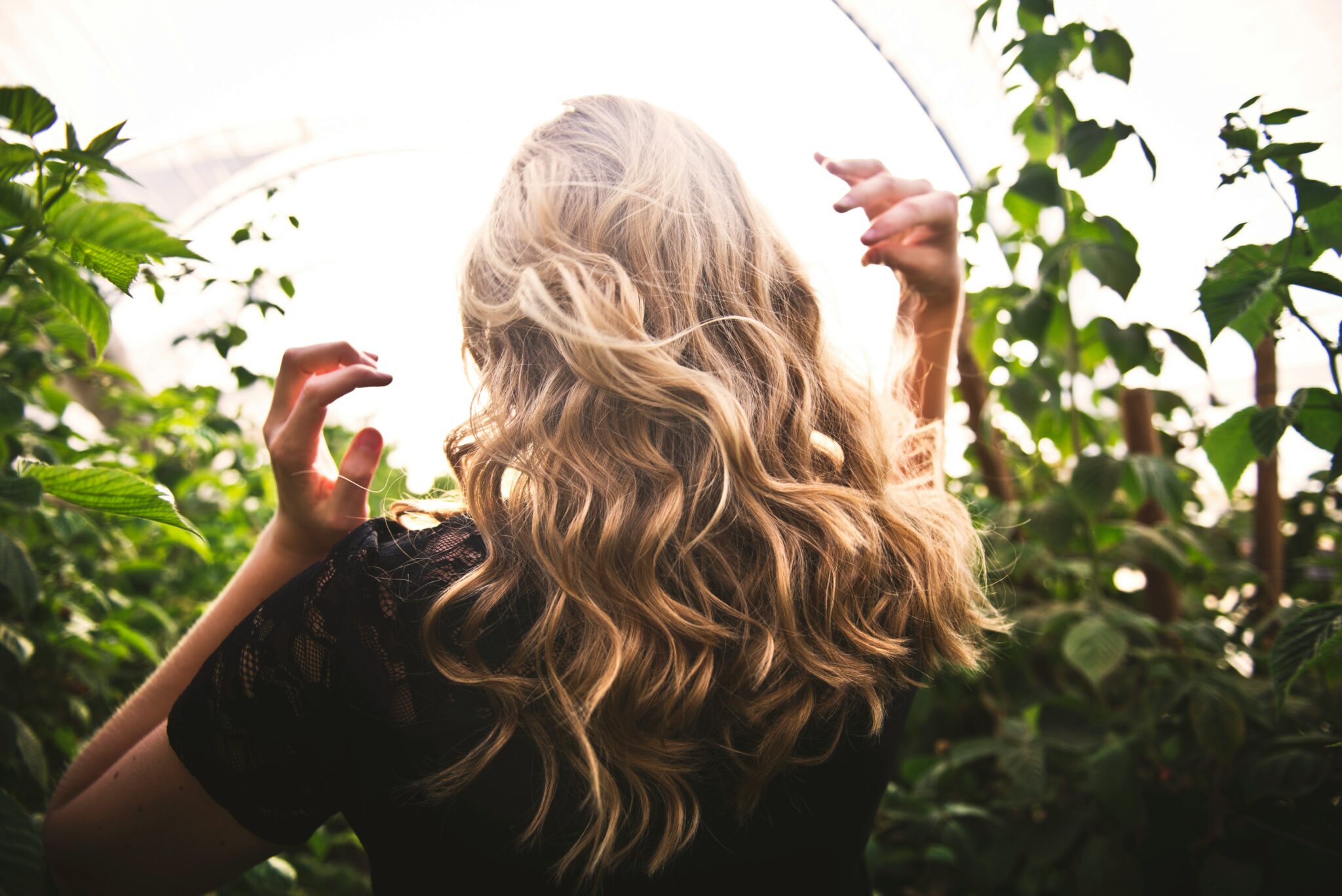 Blonde Woman in Plants